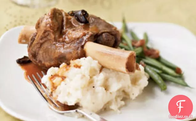 Stinchi di agnello brasati con Arancia e olive
