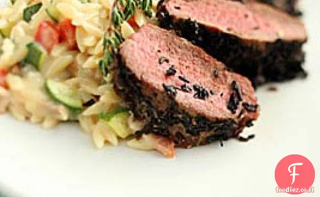 Agnello in crosta di funghi secchi