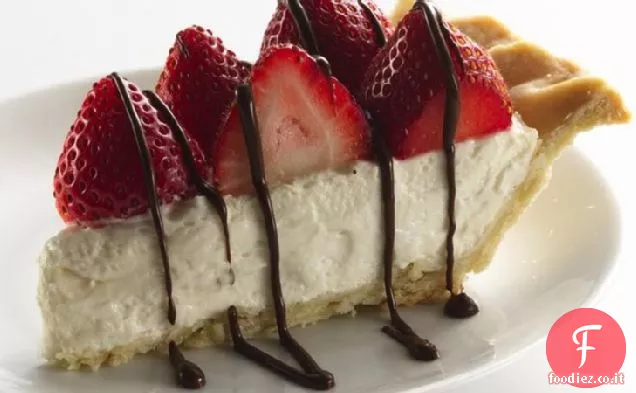 Fragole salutate e torta di panna