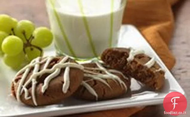 Biscotti di melassa con glassa al cioccolato bianco