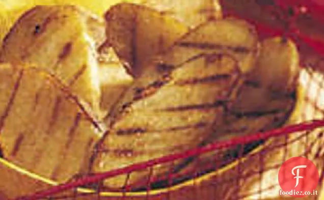Tavole di patate grigliate piccanti