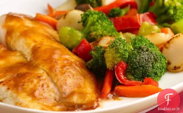 Tilapia tailandese con salsa di arachidi