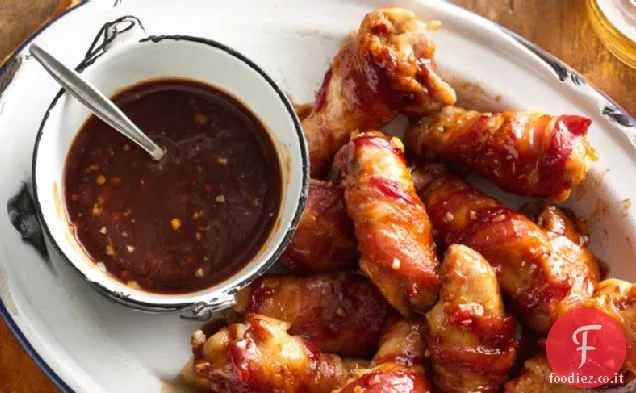 Ali di pollo avvolte con pancetta e salsa barbecue bourbon