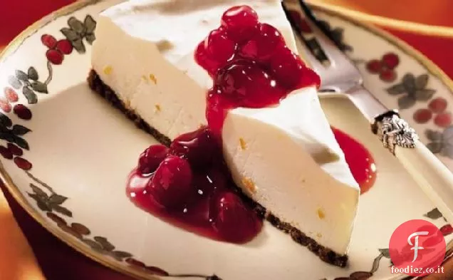 Dessert di Crème all'arancia con salsa di mirtilli rossi