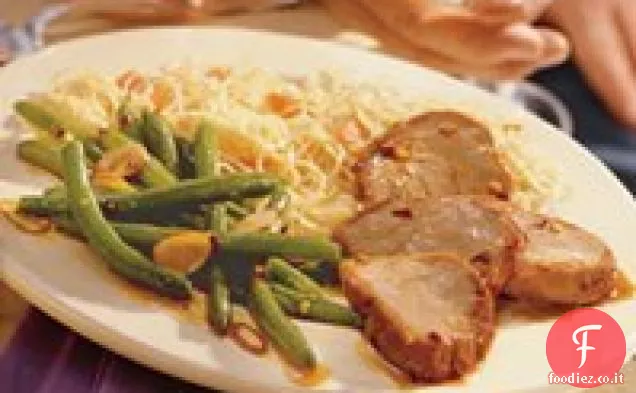 Filetto di maiale alla brace piccante con fagiolini