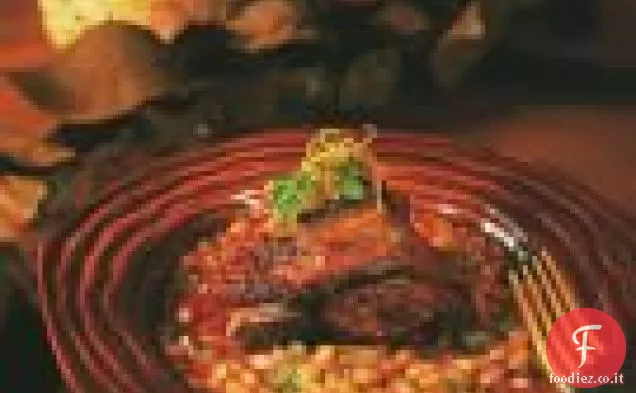 Stinchi di agnello brasati con fagioli bianchi