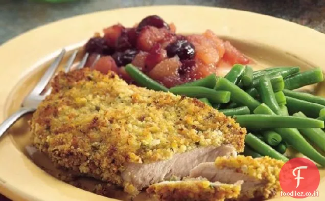 Braciole di maiale fritte al forno con salsa di mele ai mirtilli