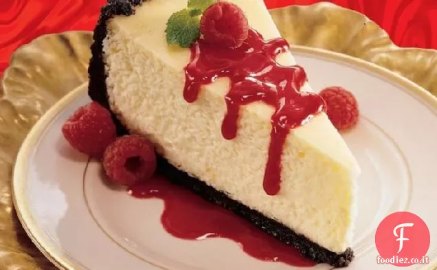 Cheesecake all'arancia con salsa di lamponi