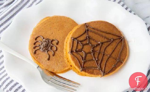 Frittelle di zucca con ragnatele al cioccolato