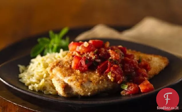 Pollo impanato con pomodori