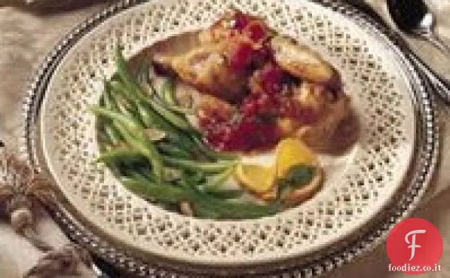 Galline della Cornovaglia grigliate con salsa di pomodoro e arancia