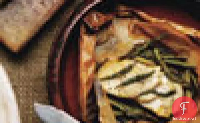 Filetti di Pesce In Pergamena Con Asparagi e Arancia