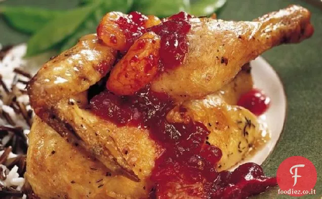 Galline corniche alle erbe con salsa di mirtilli e arance