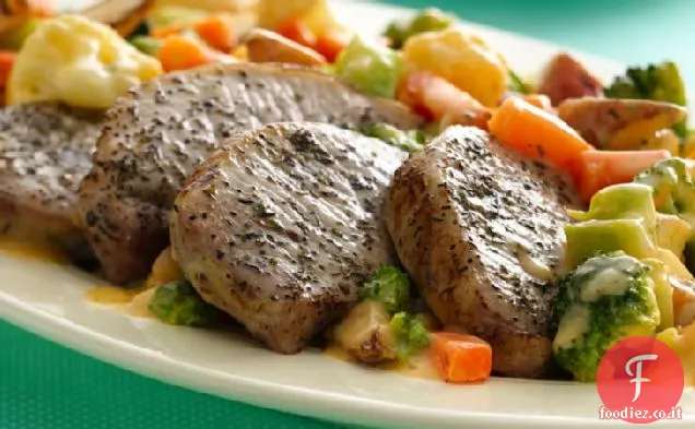 Braciole di maiale arrosto con verdure al formaggio