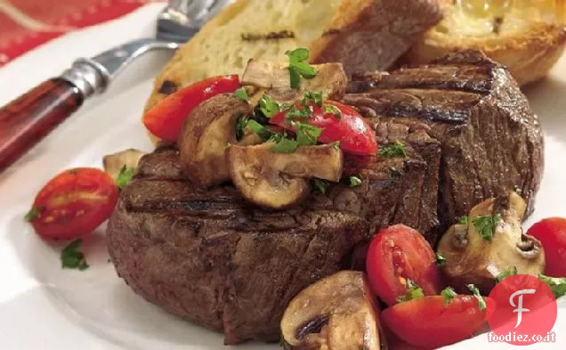Aglio alla griglia Funghi e pomodori