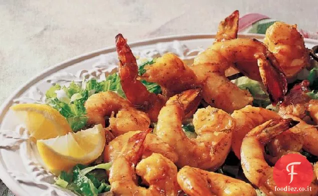 Gamberi allo spiedo alla griglia con glassa di albicocca e curry