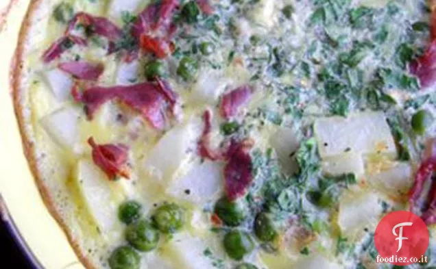 Tortilla di piselli, prosciutto e patate