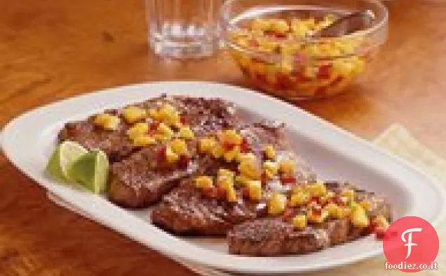 Striscia di bistecche con salsa di mango e pesca