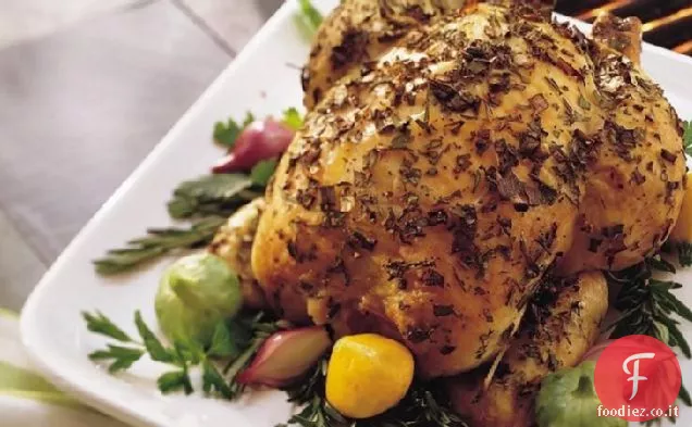 Pollo intero alla griglia con erbe