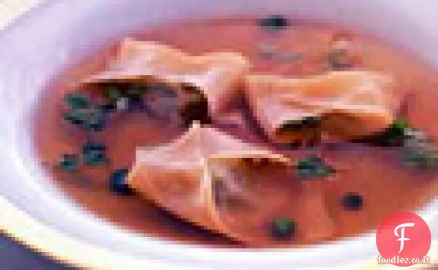 Ravioli di piselli verdi in brodo di limone