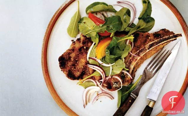 Costolette di vitello alla griglia con rucola e insalata di basilico
