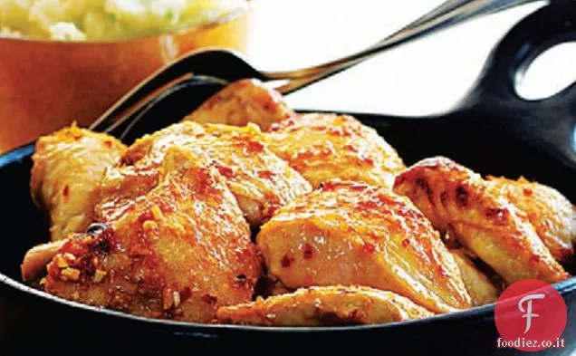 Pollo all'arancia profumato con purè di patate allo scalogno