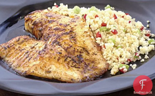 Filetti di pesce speziati con salsa di burro al limone