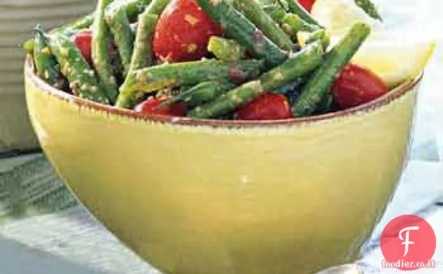 Insalata di fagioli verdi e pomodori d'uva con vinaigrette di Kalamata
