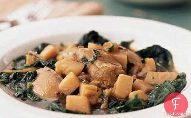 Pollo e patate sopra spinaci saltati