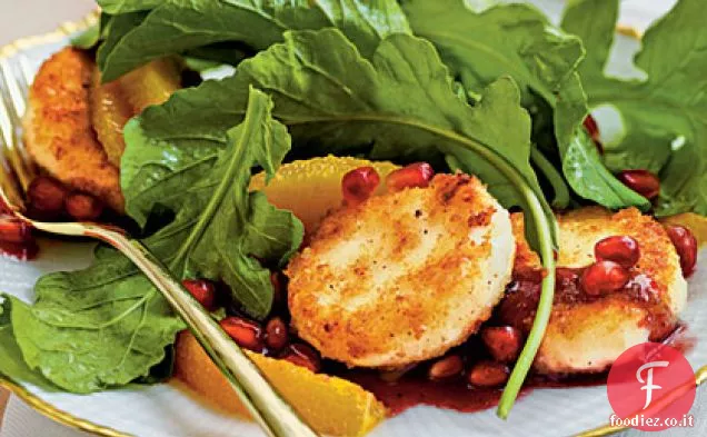 Insalata di rucola croccante con formaggio di capra e vinaigrette al melograno