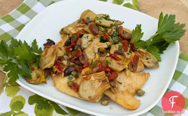 Coregone fritto in padella con carciofi, olive e pomodori secchi