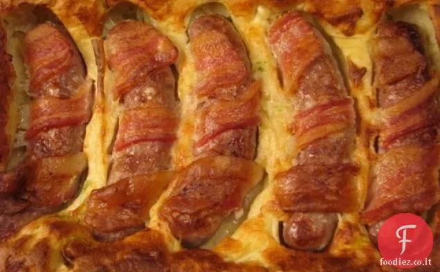 Brunch domenicale: rospi avvolti nella pancetta in un buco pieno di porri