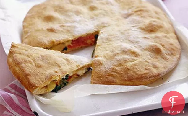 Pizza al prosciutto, spinaci e carciofi