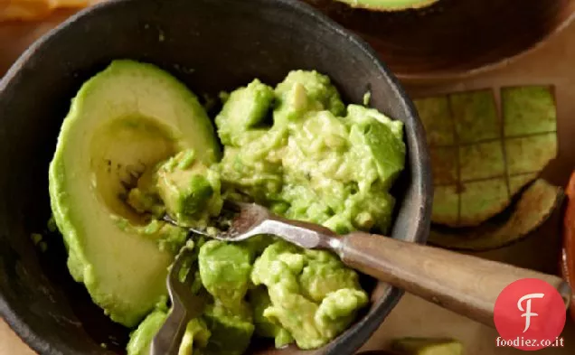 Petto di tacchino arrosto senza glutine e crema di avocado su un letto di G