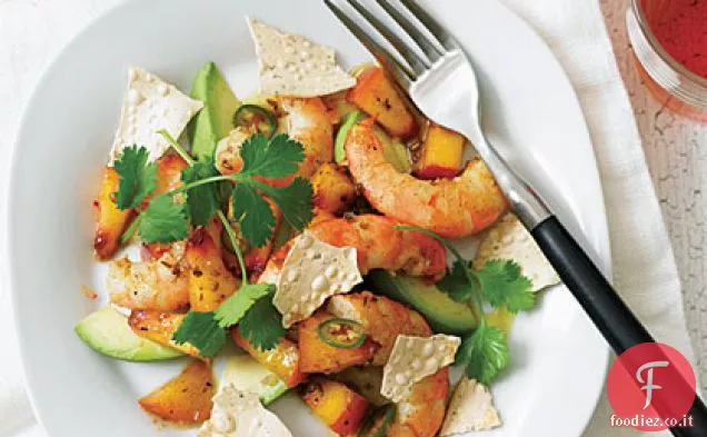 Insalata di pesche e gamberetti al curry