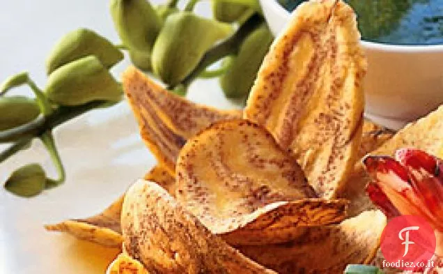 Patatine di piantaggine con salsa di coriandolo caldo