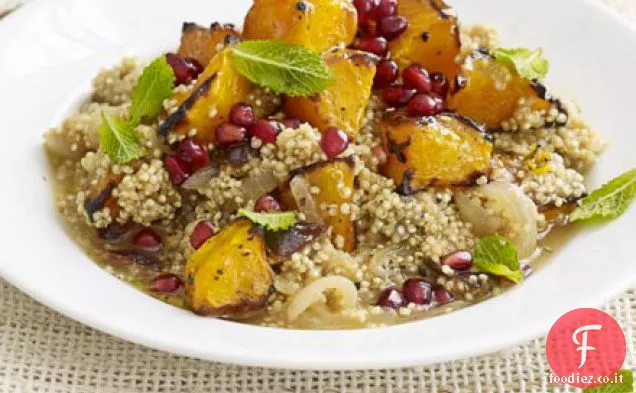 Stufato di quinoa con zucca, prugne e melograno
