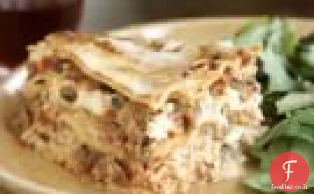 Lasagna di funghi, salsiccia e peperoni rossi arrostiti