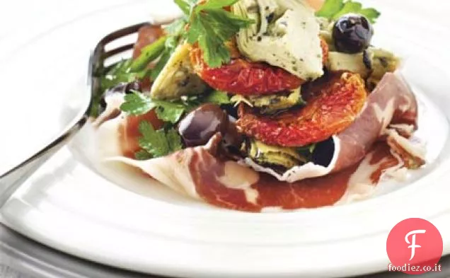 Pomodori arrosto lento con prosciutto iberico e carciofi