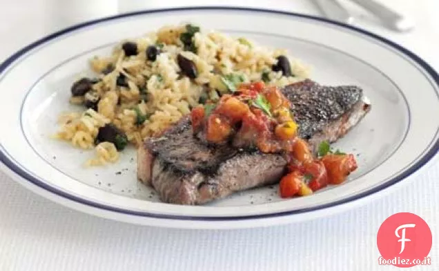 Bistecca con riso speziato e fagioli