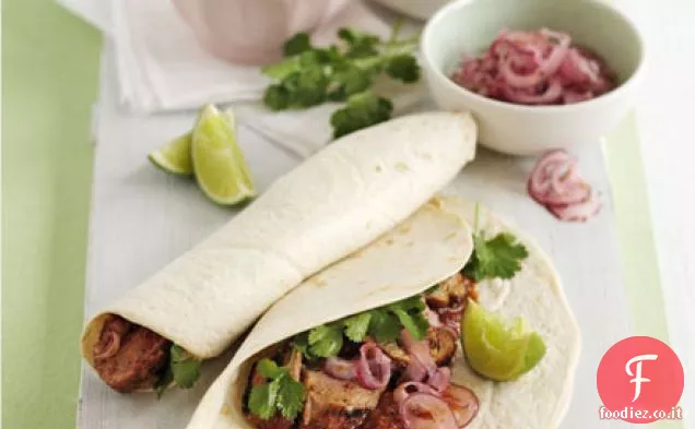 Filetto di maiale con salsa chipotle e cipolle rosse in salamoia