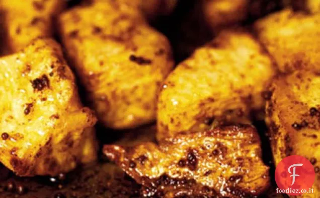 Pezzi di sedano rapa arrostiti e al curry