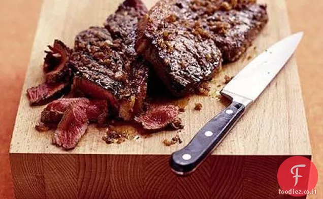 Sizzling bistecca con scalogno marinata