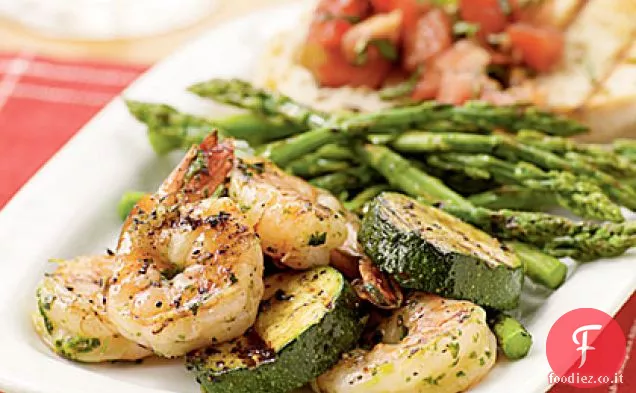 Spiedini di gamberi alle erbe italiane