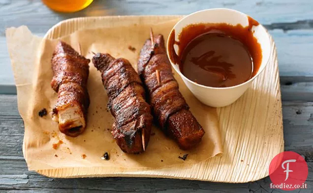 Ali di maiale avvolte con pancetta