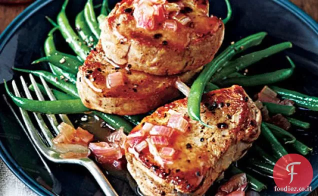 Medaglioni di maiale con salsa whisky-Cumberland e cuori di fagiolo bianco