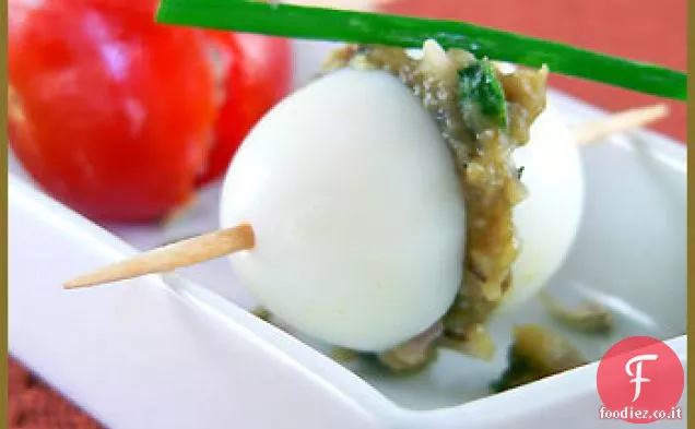 Anacardi e purea di melanzane in uova di quaglia