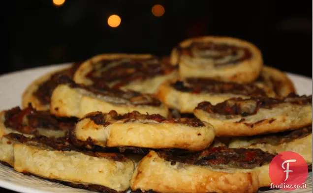 Girandole di melanzane con formaggio di capra e pomodori secchi