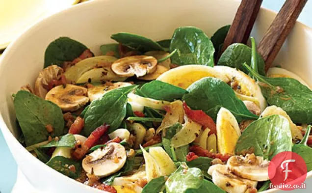 Insalata di spinaci, funghi e finocchi con vinaigrette di pancetta calda