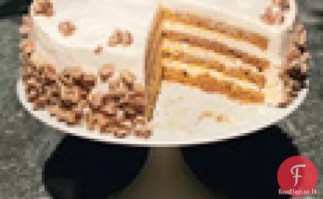Torta di zucca a quattro strati con glassa di formaggio cremoso all'arancia